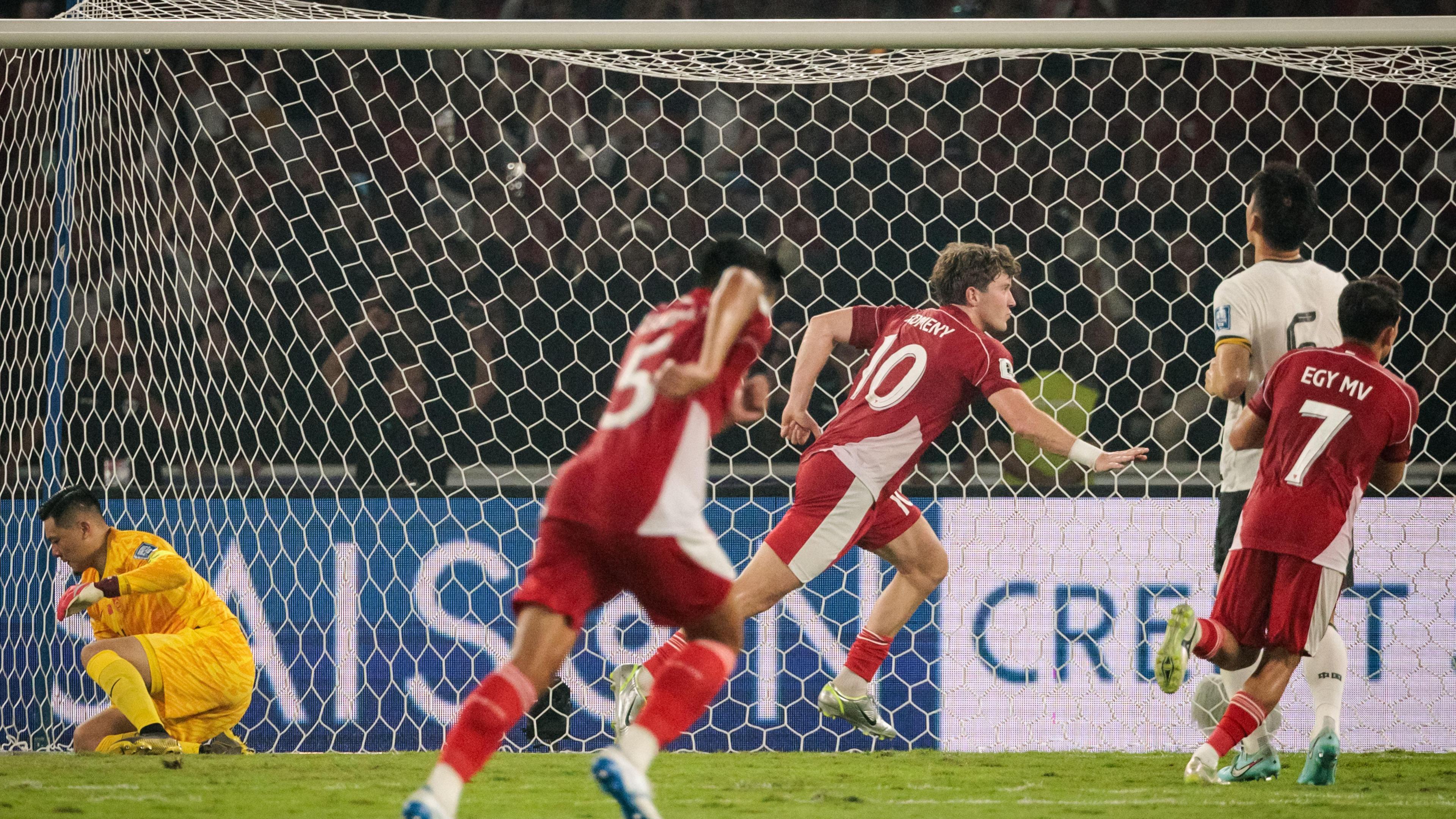 Ole Romeny celebrates scoring a penalty for Indonesia in their 1-0 win over China in an Asian World Cup qualifier