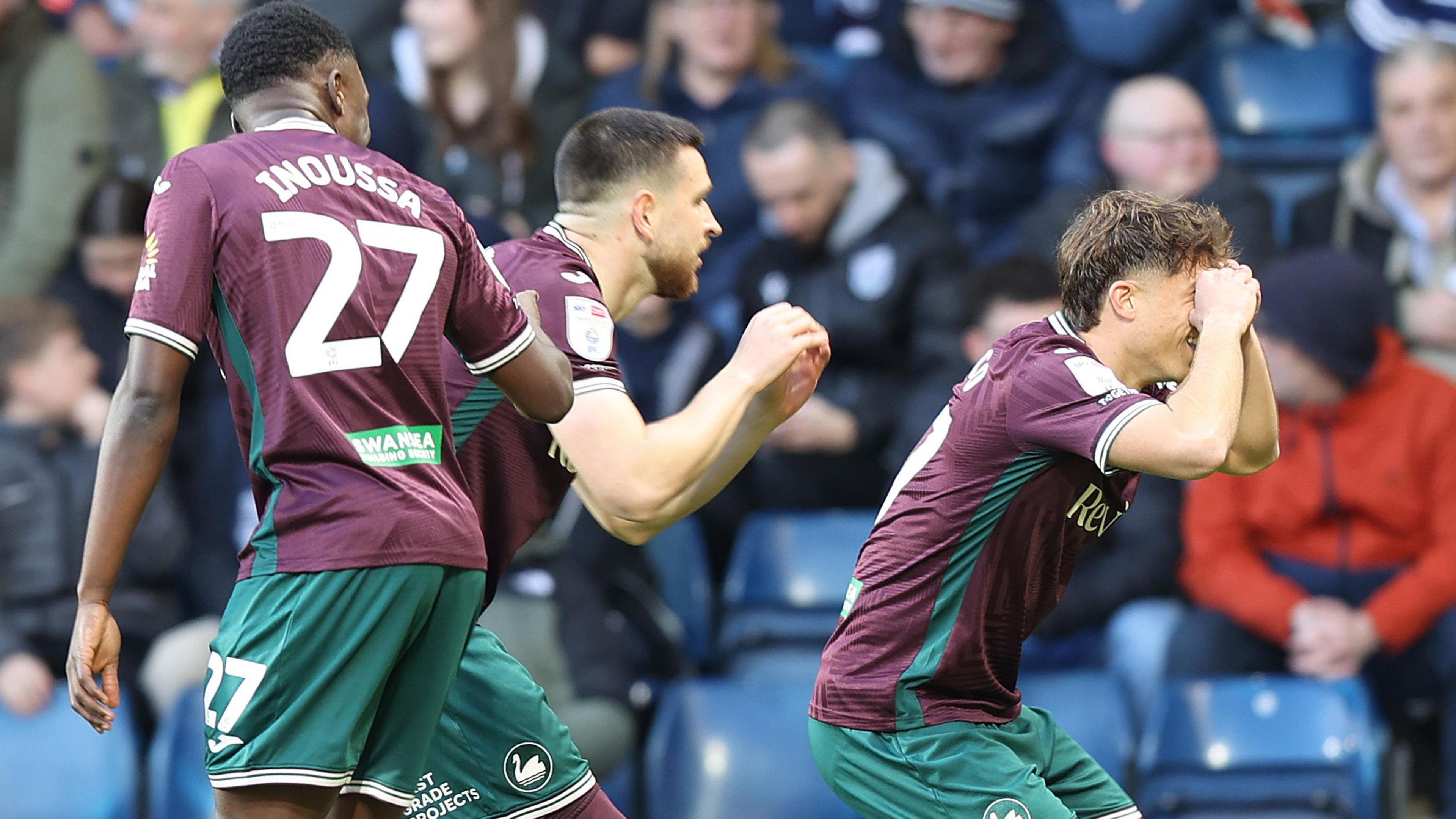 Swansea players celebrate Zan Vipotnik's goal