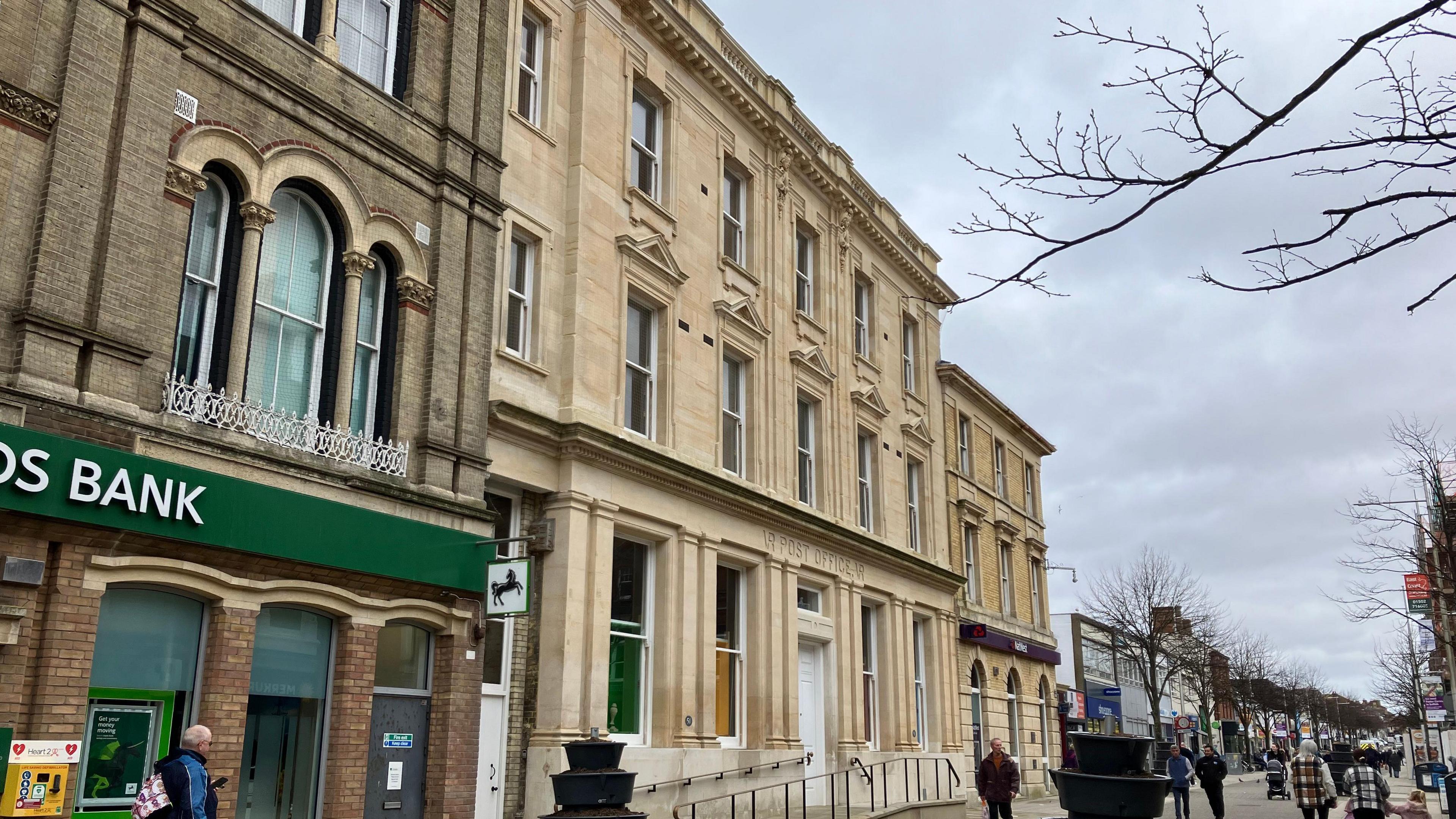 The stone facade of the former Post Office building in Lowestoft 