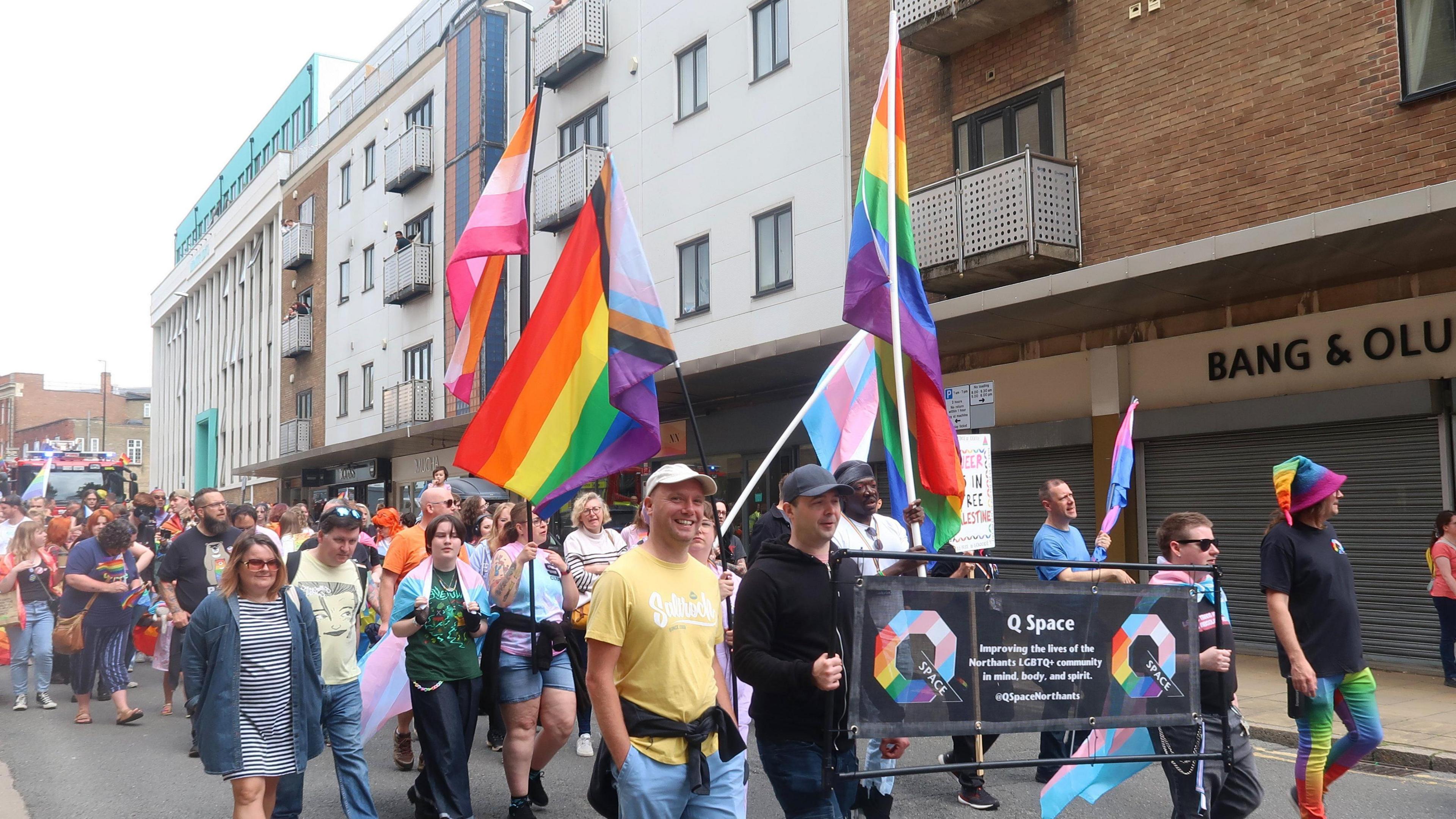 Pride march goes along Derngate in Northampton