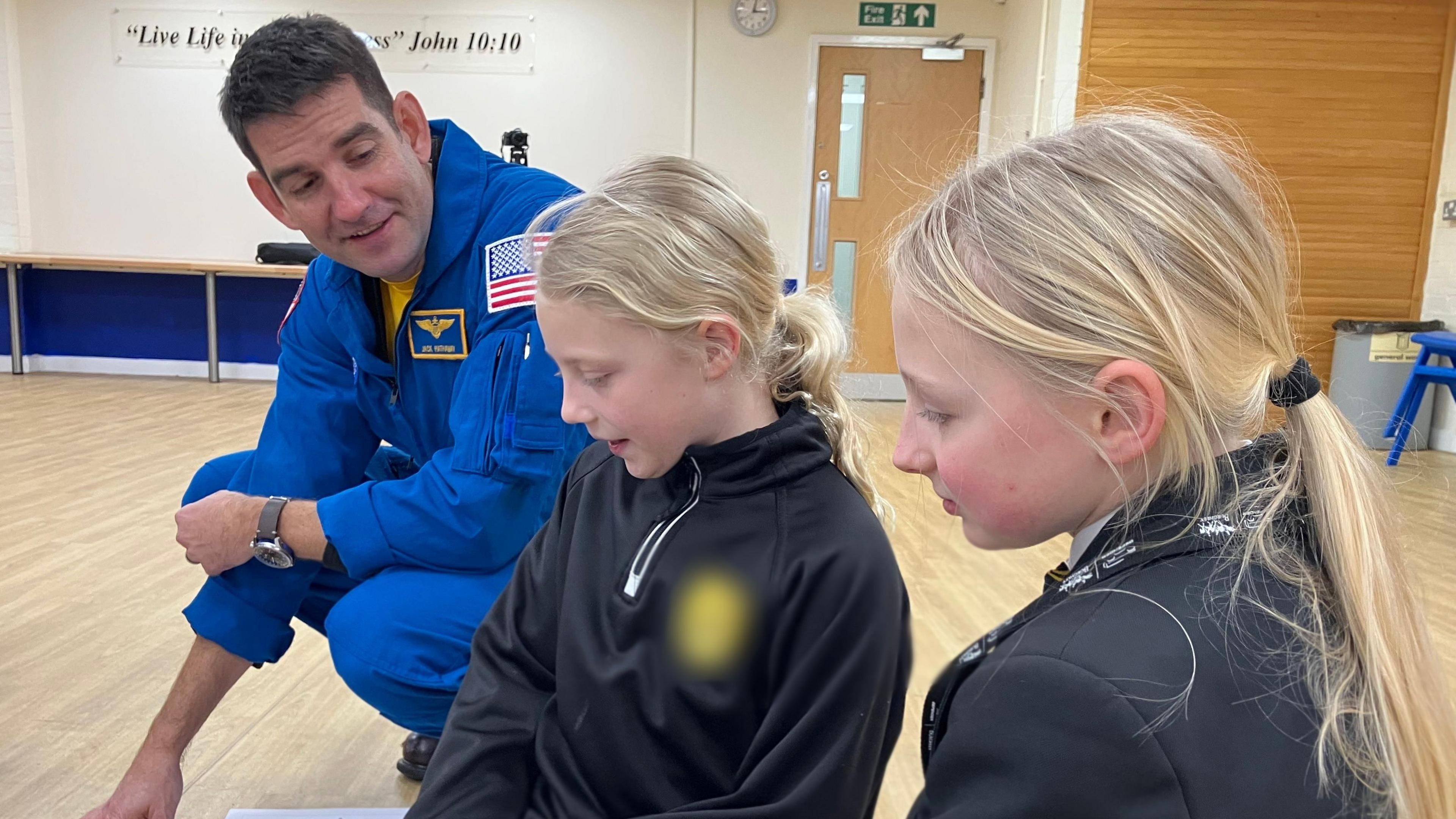 Cdr Jack Hathaway meeting students at a primary school in Bedfordshire