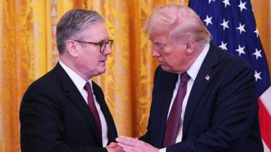 UK Prime Minister Keir Starmer and US President Donald Trump shake hands at a joint press conference in the East Room at the White House in February 2025