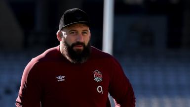 Joe Marler looks towards the camera in an empty stadium