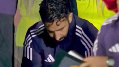 Ruben Amorim sat in the dugout looking down