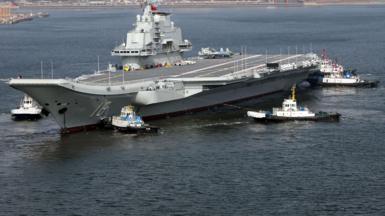 Aircraft carrier Liaoning sets for sea trial at Dalian shipyard with the help of towboats after nearly one year of maintenance on February 29, 2024 in Dalian, Liaoning Province of China.