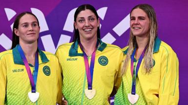Australia swimmers celebrate winning gold, silver and bronze in the women's 50m freestyle
