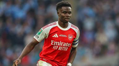Bukayo Saka playing for Arsenal