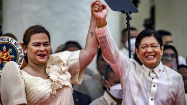 Ferdinand "Bongbong" Marcos Jr., together with the new Vice President Sara Duterte, pose for pictures after taking his oath as the next President, at the National Museum of Fine Arts on June 30, 2022 in Manila, Philippines.