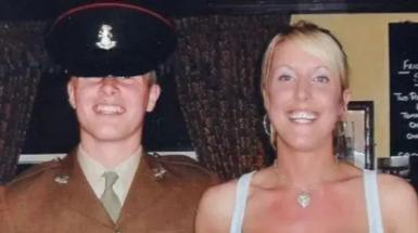 A picture of a man in army uniform and a woman in a white dress. It's a family photo