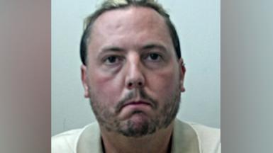 mugshot of Jamie Varley, who is wearing a cream polo shirt
