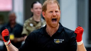 Prince Harry wearing gloves as as he played wheelchair rugby at an event in Birmingham for the Invictus Games