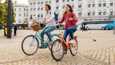 Young Danes cycling in Copenhagen