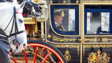 The King in the royal carriage