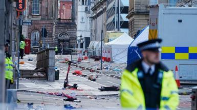 olice tents surrounded by debris at the scene in Water Street near the Liver Building in Liverpool 