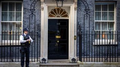 Police officer stands outside 10 Downing Street