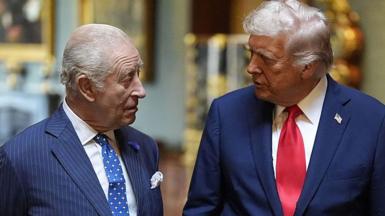 King Charles III and Donald Trump stood side by side.