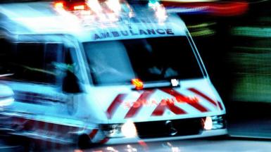 An ambulance on the way to the scene of an accident in Sydney on 20 July 2002. 
