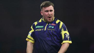 Luke Littler celebrates