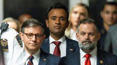 Speaker Mike Johnson, left, former presidential candidate Vivek Ramaswamy and Congressman Cory Mills at the trial on Tuesday