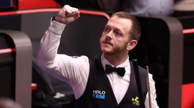 Mark Allen celebrates