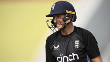 Joe Root smiling during practice