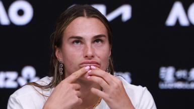 Aryna Sabalenka reacts during her post-Australian Open final news conference