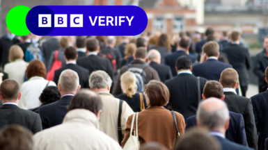 A photo of a crowd of people walking away from the camera