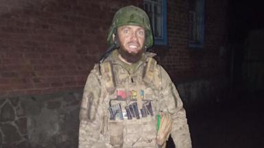 Vasyl pictured wearing his military uniform