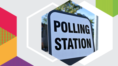 Colourful graphic showing a polling station sign