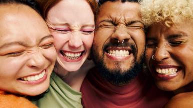 Stock image of people smiling