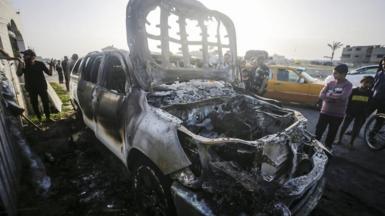 A destroyed car in Gaza