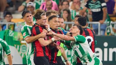 Antony of Real Betis fights with Alex Scott of AFC Bournemouth during the pre-season friendly