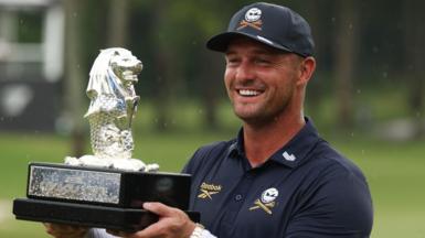 Bryson DeChambeau holds the LIV Golf Singapore trophy