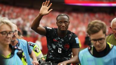 Ismael Kone waves to fans