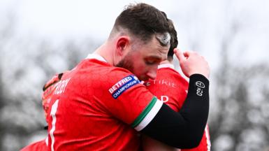Joe Baldwin and Lloyd Roby of North Wales Crusaders embrace