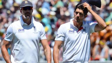 Kevin Pietersen and Alastair Cook walk off together