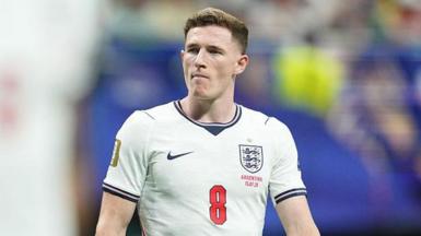 Elliot Anderson in action for England at the World Cup, wearing white kit with number 8 on front of shirt