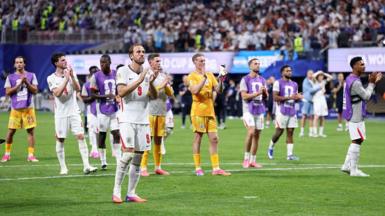 England players on the field applauding the fans after the World Cup semi-final defeat to Argentina