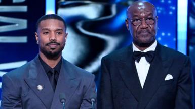 Michael B. Jordan and Delroy Lindo present the Special Visual Effects Award on stage during the EE BAFTA Film Awards 2026 at The Royal Festival Hall on February 22, 2026 in London, England