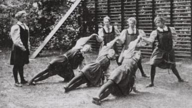 Martina Bergman Osterberg's students contesting a netball game outside at Dartford in 1897