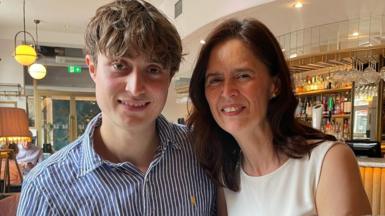 A mum and son in a restaurant