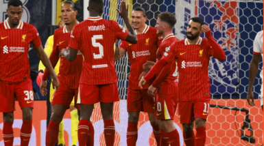 Liverpool's players celebrate after scoring against RB Leipzig