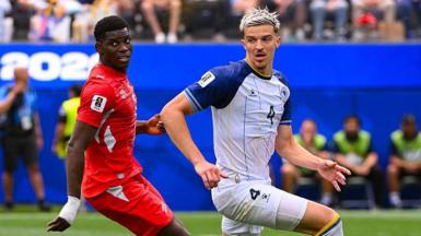 Tarik Muharemovic of Bosnia and Herzegovina runs with the ball during the FIFA World Cup 2026 Group B match against Switzerland
