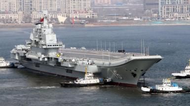 Aircraft carrier Liaoning sets for sea trial at Dalian shipyard with the help of towboats after nearly one year of maintenance on February 29, 2024 in Dalian, Liaoning Province of China.