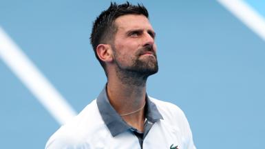 Novak Djokovic looks upwards during his Cincinnati Open match
