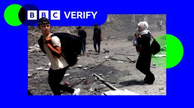 A photo of Palestinians in Gaza City with an outline of the BBC Verify colours and logo.