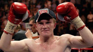 Ricky Hatton raises his fists