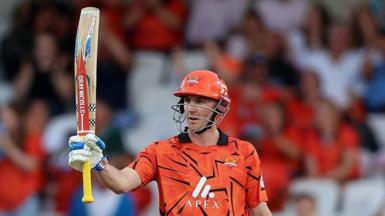 Harry Brook raises his bat for fifty for Sunrisers Leeds
