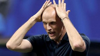 England manager Thomas Tuchel has an exasperated look as he raises his hands to his head