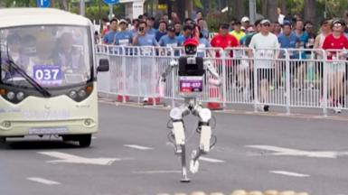 A robot runs on a street in Beijing